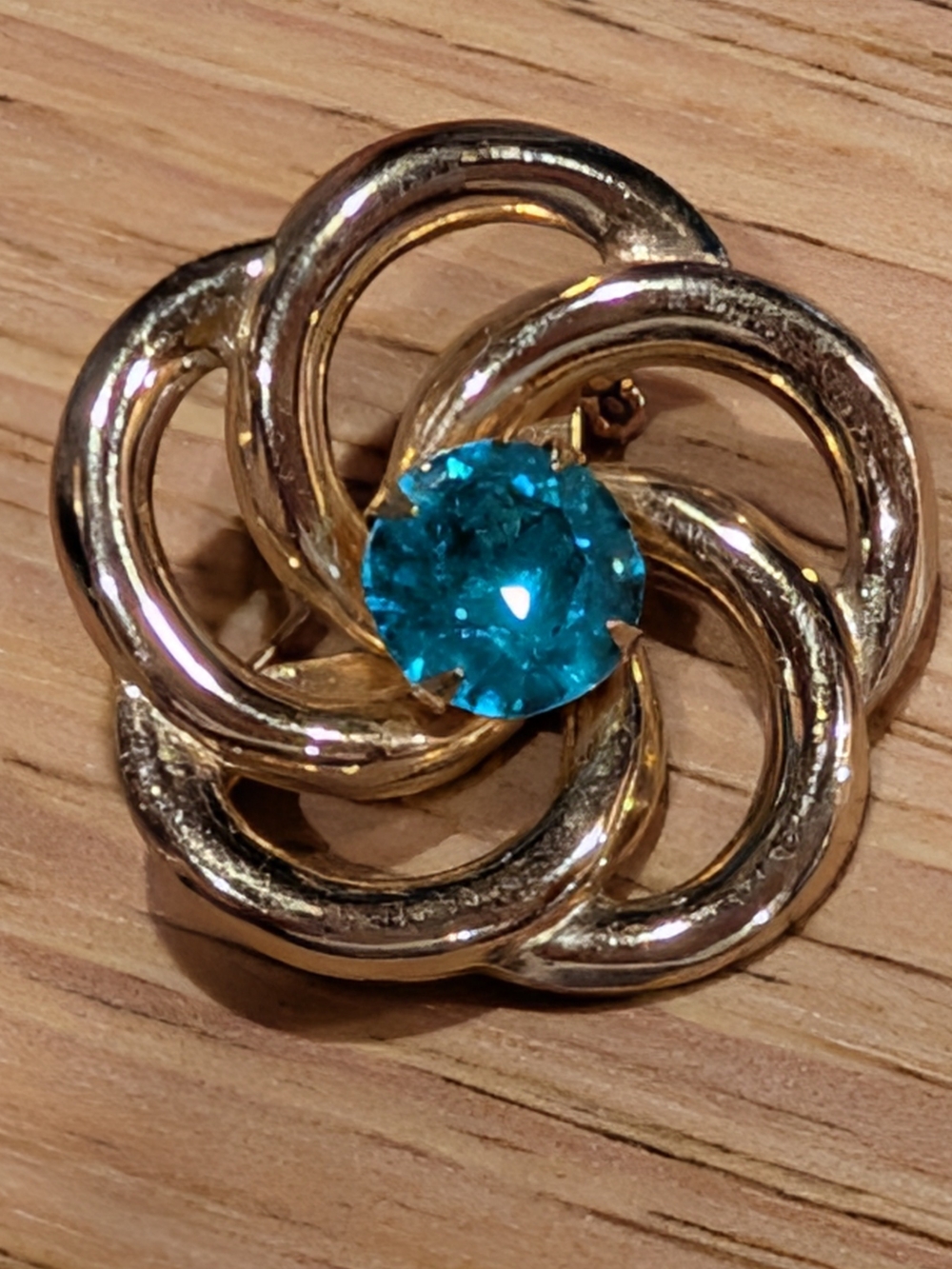 Gold-Tone Floral Pin Brooch With Blue Center Stone